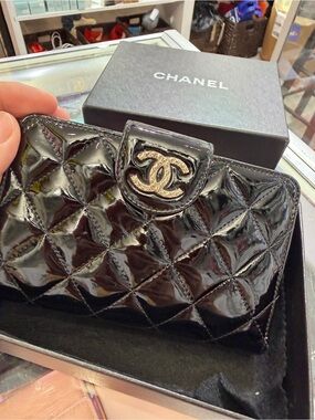 CHANEL White and Gold Authenticity Sticker Close-Up